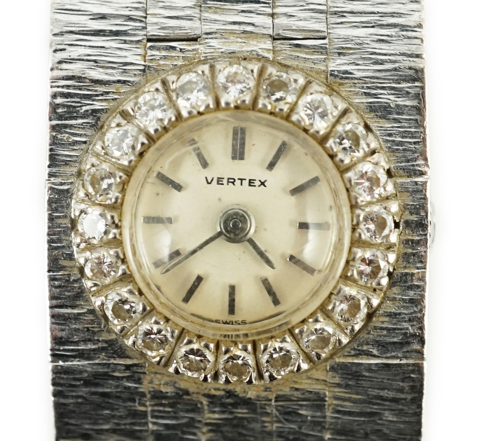 A lady's 1960's 18ct white gold and diamond set Vertex manual wind bracelet watch
